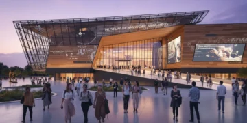 Modern museum entrance at dusk, symbolizing new perspectives on American history and culture
